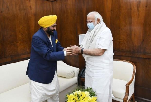 Punjab Chief Minister Bhagwant Mann, Bhagwant Mann met Prime Minister Narendra Modi, Prime Minister Narendra Modi, Punjabs financial condition is in the doldrums, 50,000 crores package,  Punjab News, Political News- True Scoop